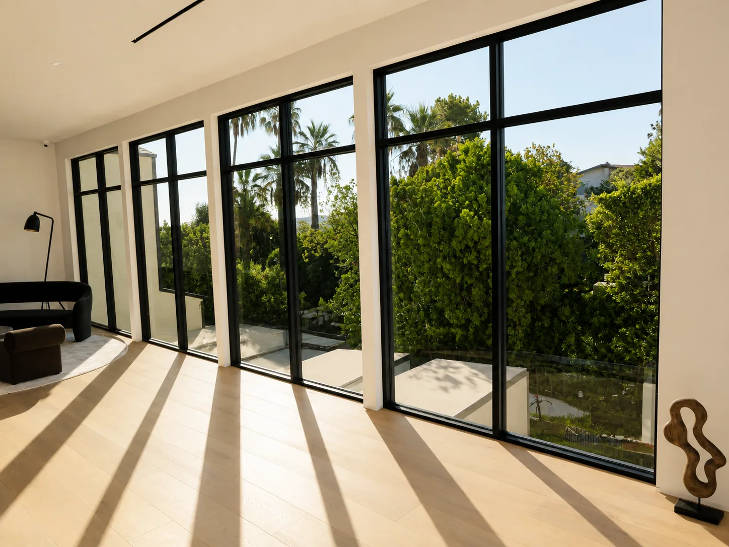 A run of tall windows with transoms above head height